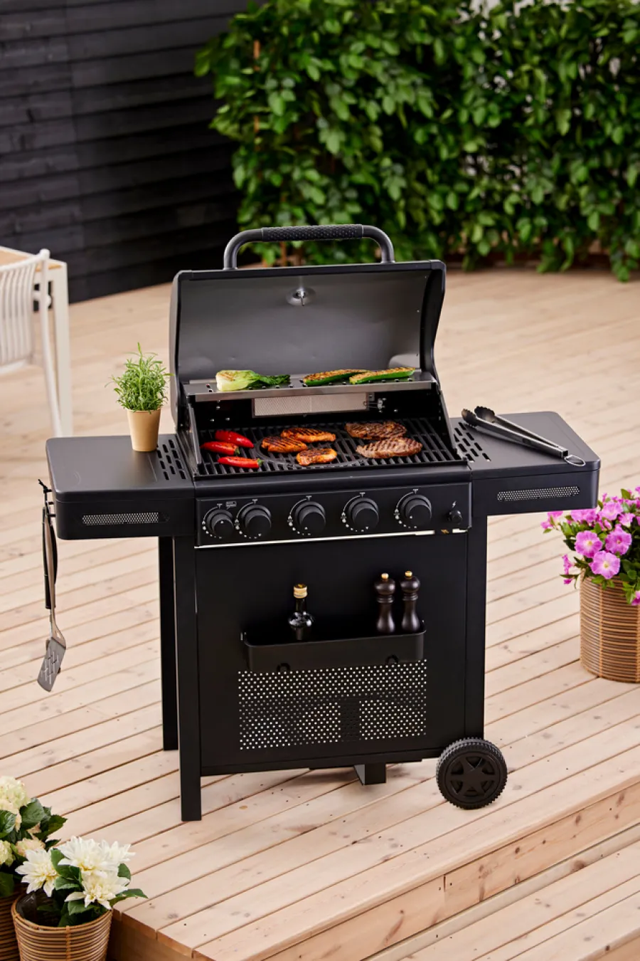 Gassgrill^Grillexpert Gassgrill med 4 brennere og bakbrenner – Svart